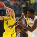 Michigan freshman Mitch McGary looks to pass the ball during the first half against Florida at Cowboys Stadium on Sunday, March 31, 2013. Melanie Maxwell I AnnArbor.com